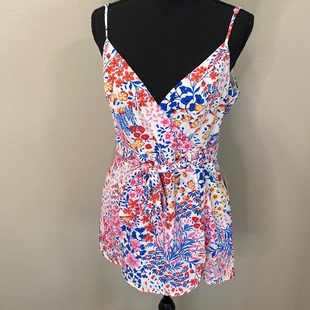 B. Darlin floral tie romper with pockets